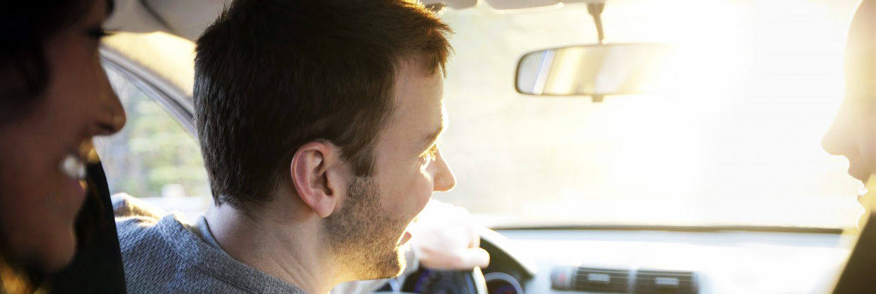 Friends talking while traveling in a car